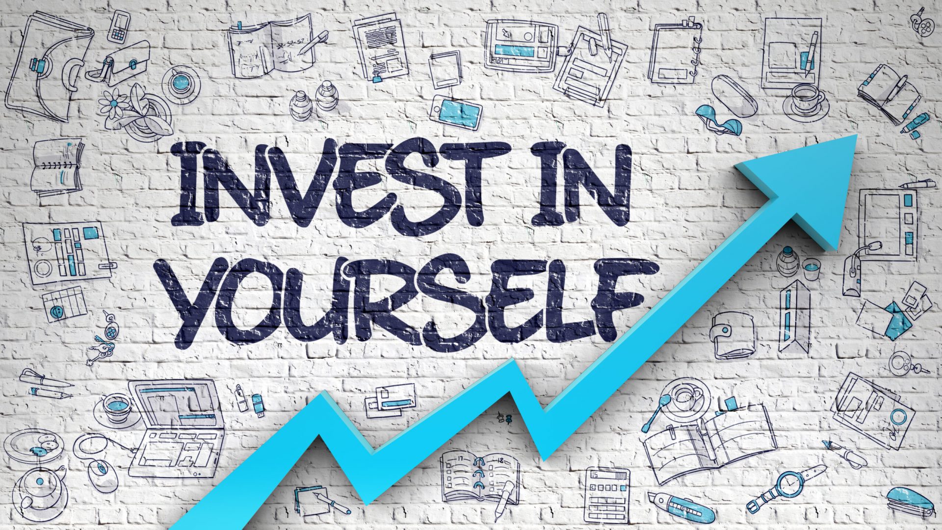 Invest In Yourself Drawn on White Brick Wall